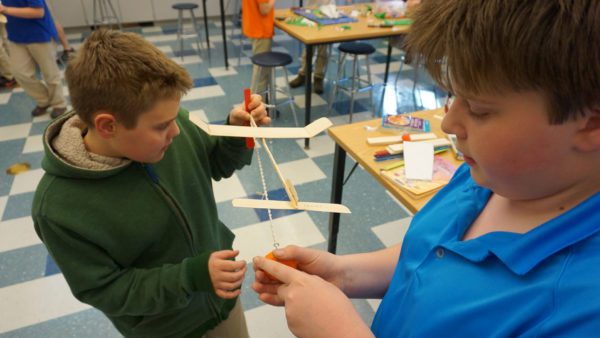 Two boys work together on a project in class at Ashbrook Independent School