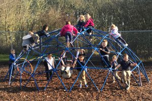 Students play on the playground at Ashbrook Independent School